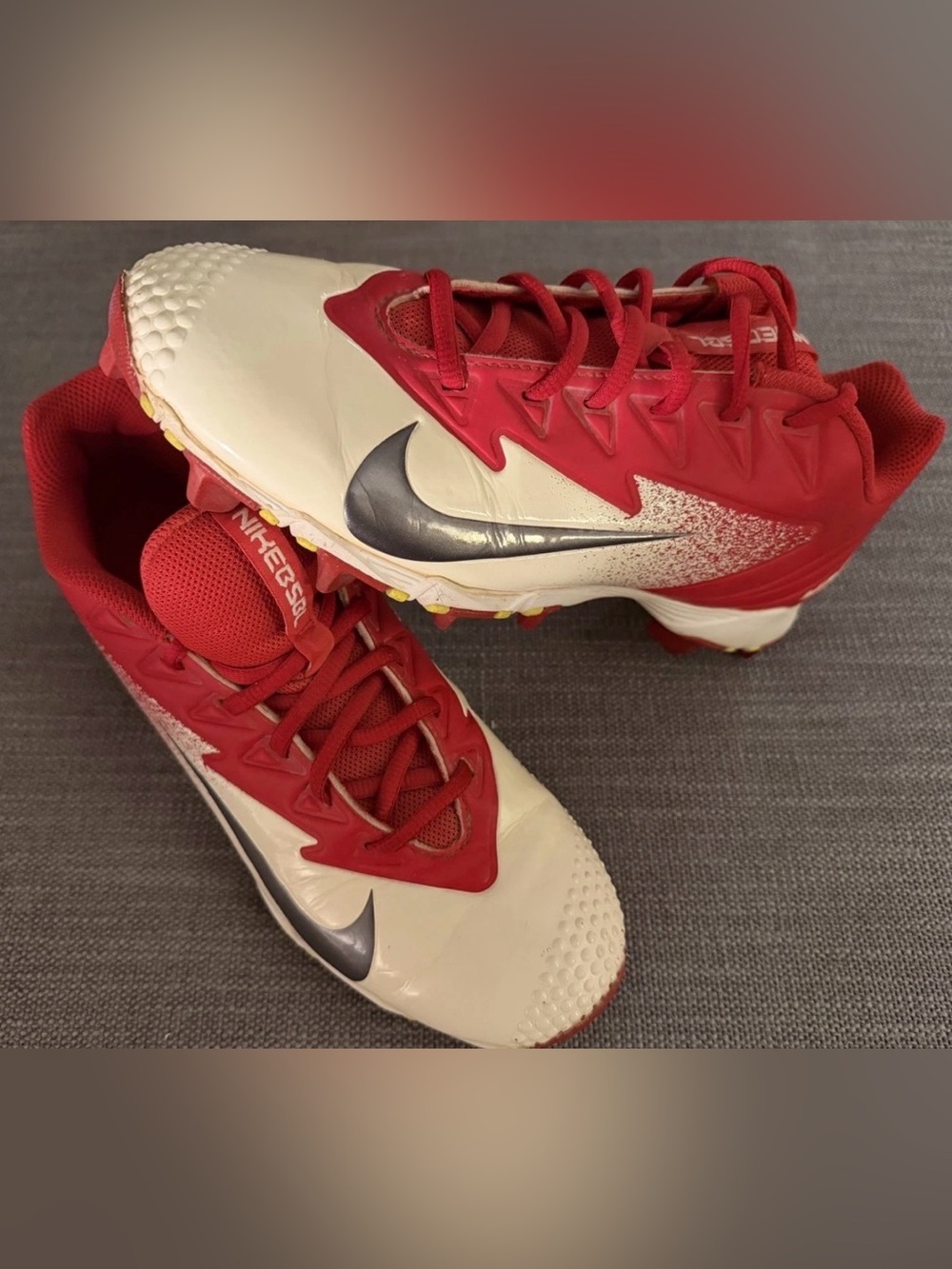 Nike Red and White Sneakers with Black Swoosh